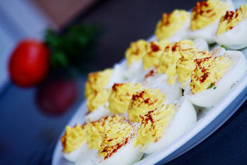 Stuffed eggs with avocado mayo dip